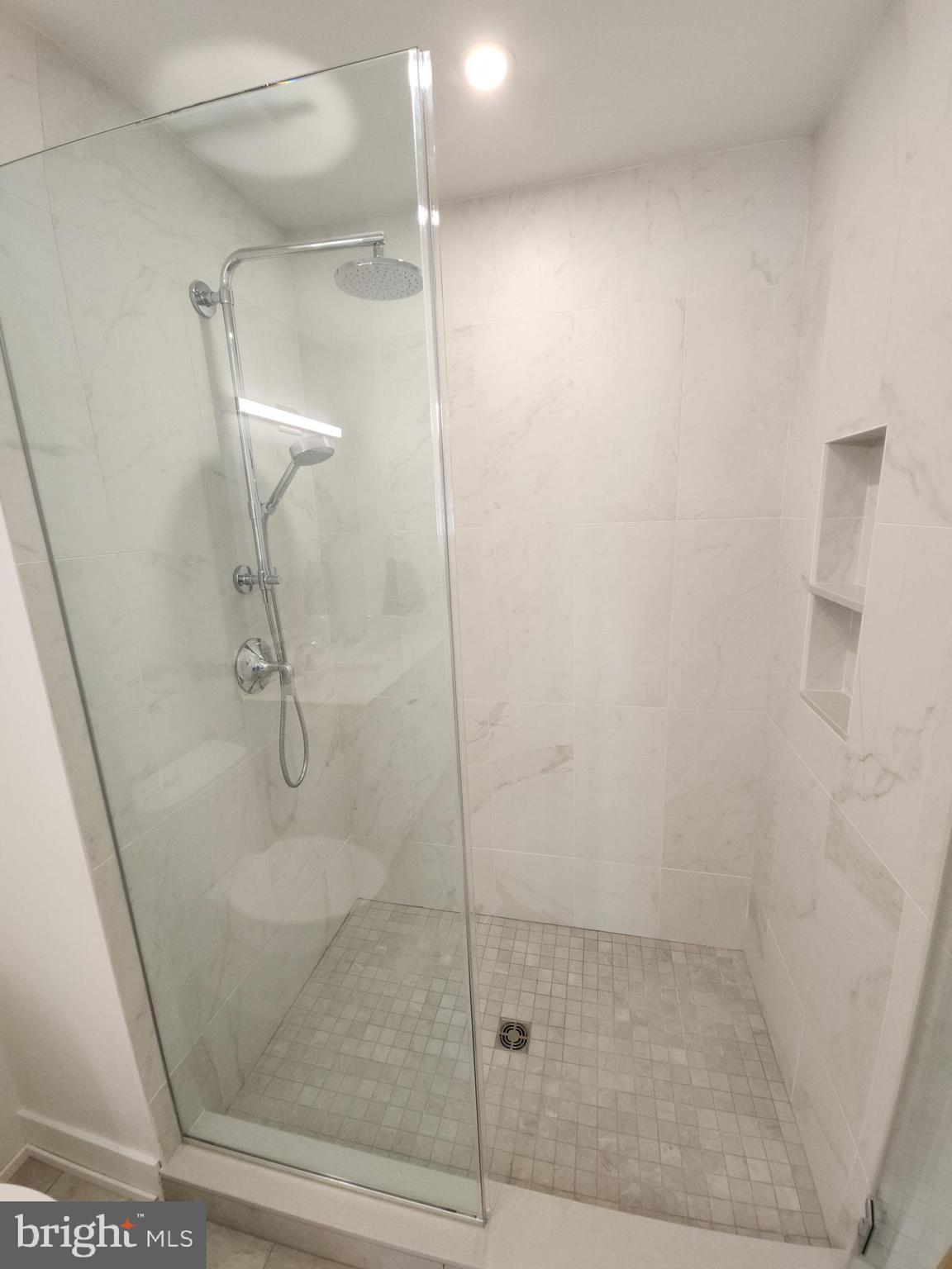 8610 Evergreen Place, Unit 100 Philadelphia, PA 19118 - Photo 15 of 21 a bathroom with a shower