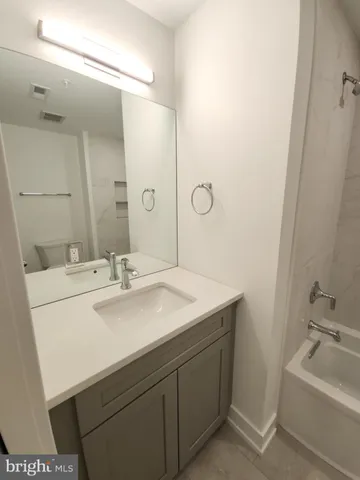 a bathroom with a bathtub