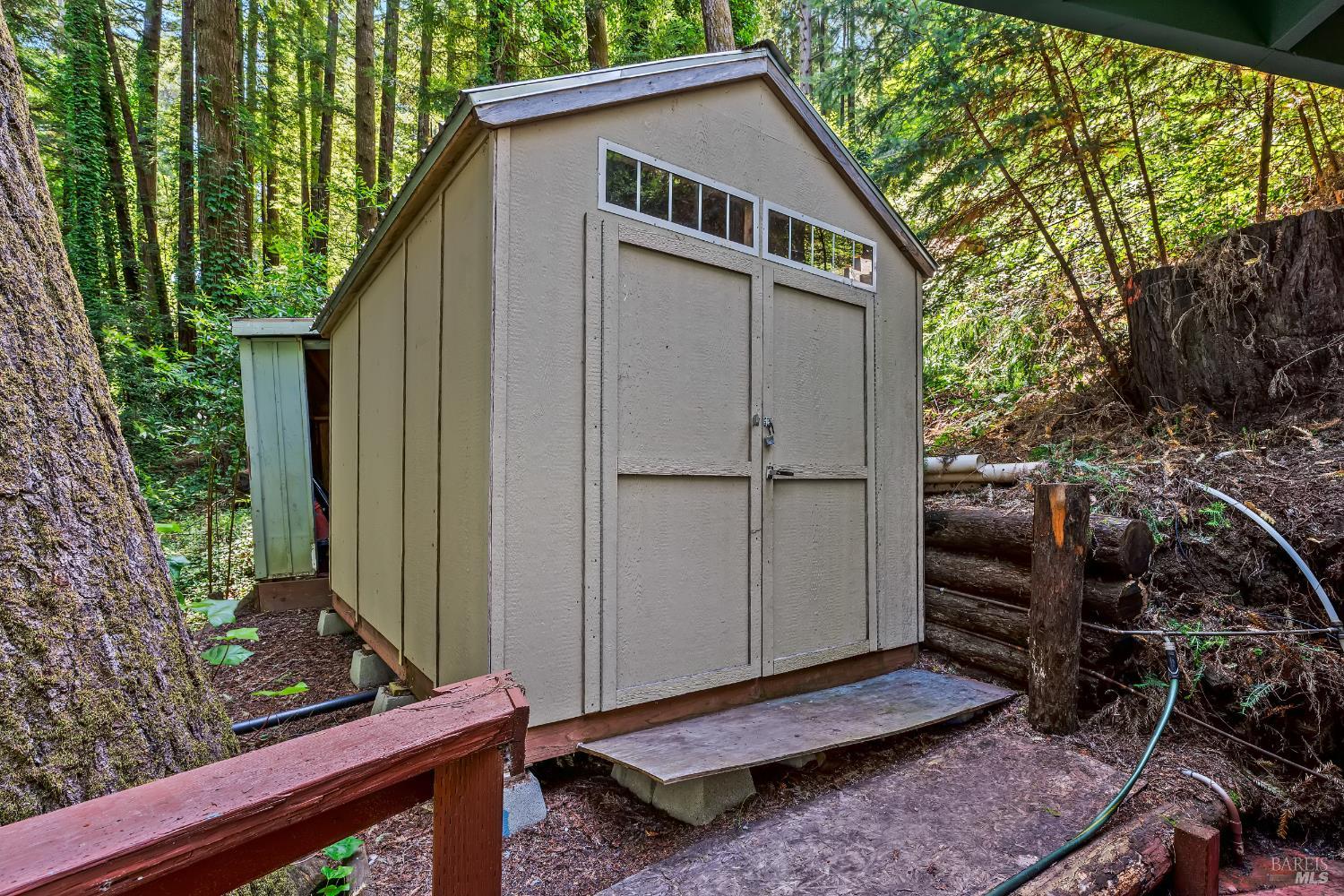 18475 Old Monte Rio Road Guerneville, CA 95446 - Photo 25 of 64 Storage shed with washer and dryer right next to the shower