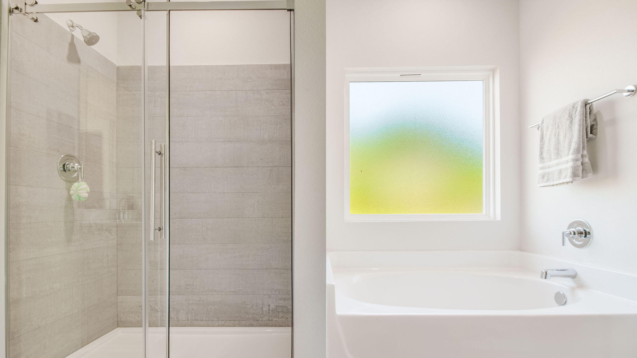 5848 Dove Nest Road Gulf Breeze, FL 32563 - Photo 20 of 32 a bathroom with a bathtub and shower