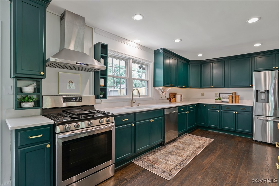 7660 Cherokee Road Richmond, VA 23225 - Photo 13 of 36 a kitchen with stainless steel appliances granite countertop a stove refrigerator and cabinets