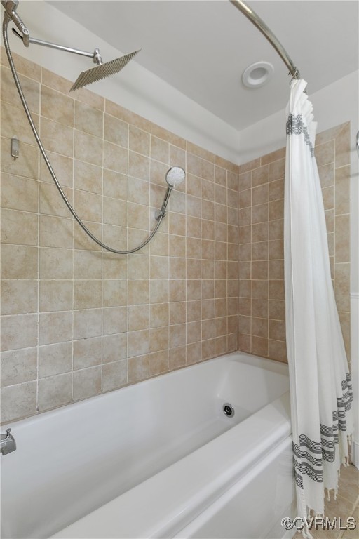 7660 Cherokee Road Richmond, VA 23225 - Photo 25 of 36 a bathroom with a shower and a bath tub