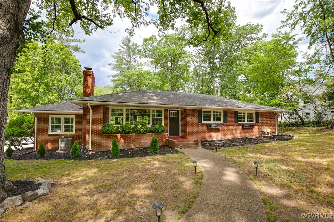 7660 Cherokee Road Richmond, VA 23225 - Photo 3 of 36 a front view of house with yard and green space