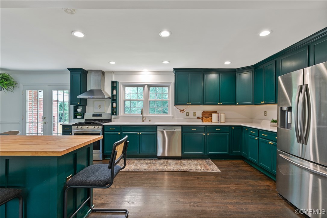 7660 Cherokee Road Richmond, VA 23225 - Photo 10 of 36 a kitchen with lots of counter top space sink and refrigerator