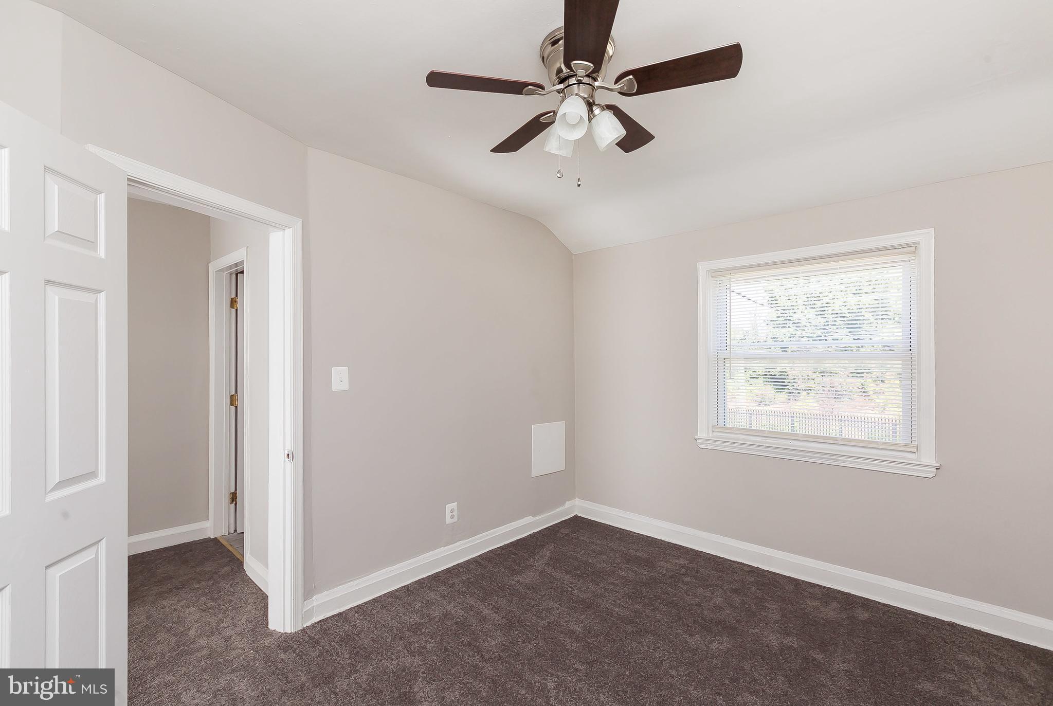 960 Middlesex Road Essex, MD 21221 - Photo 16 of 29 a view of an empty room with a window