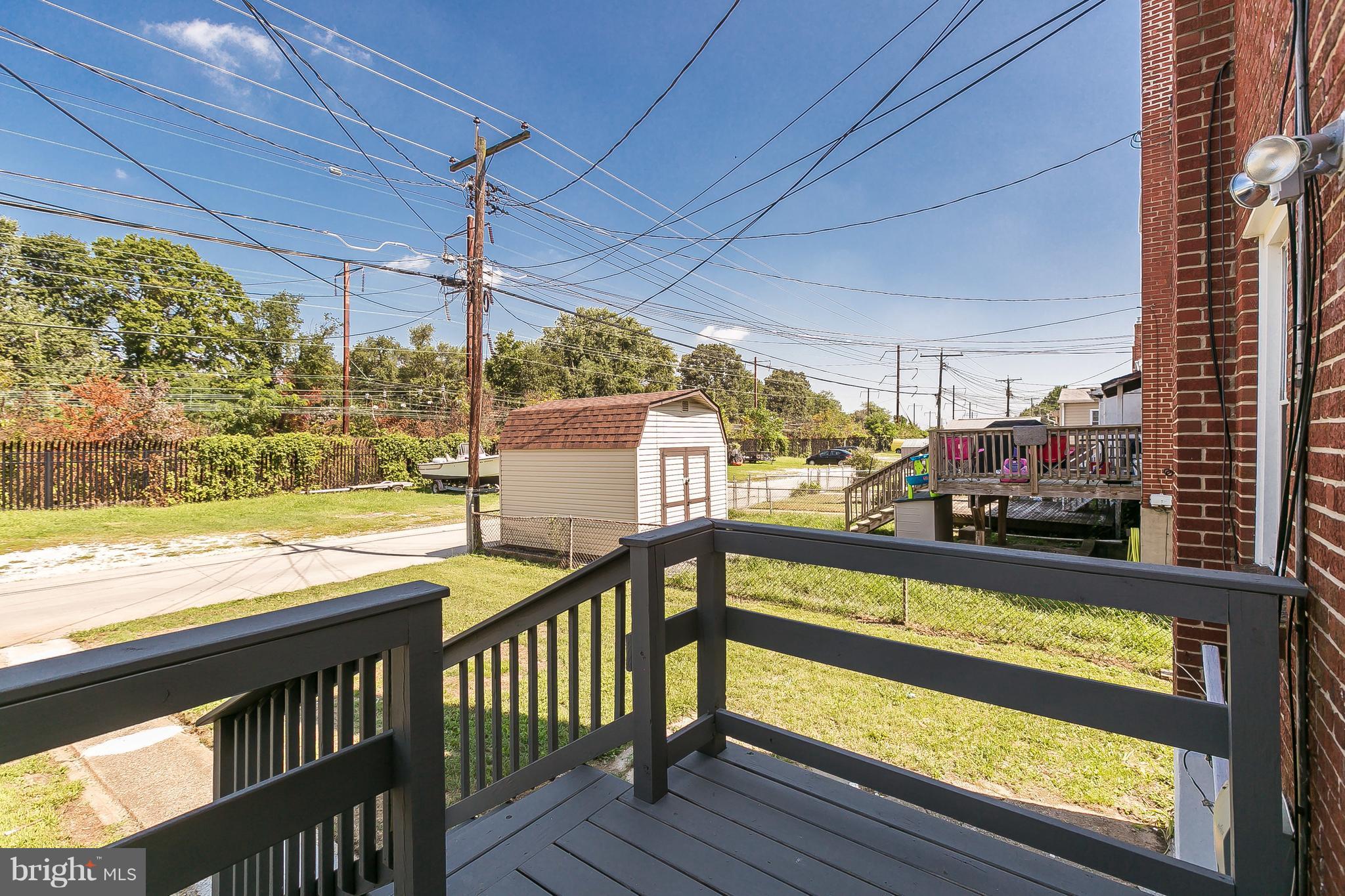 960 Middlesex Road Essex, MD 21221 - Photo 25 of 29 a view of an outdoor kitchen with seating area