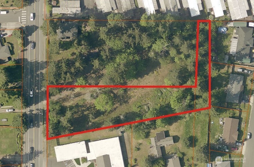 2-xxx R Street Southeast Auburn, WA 98002 - Photo 7 of 21 a street view along with city and flowers