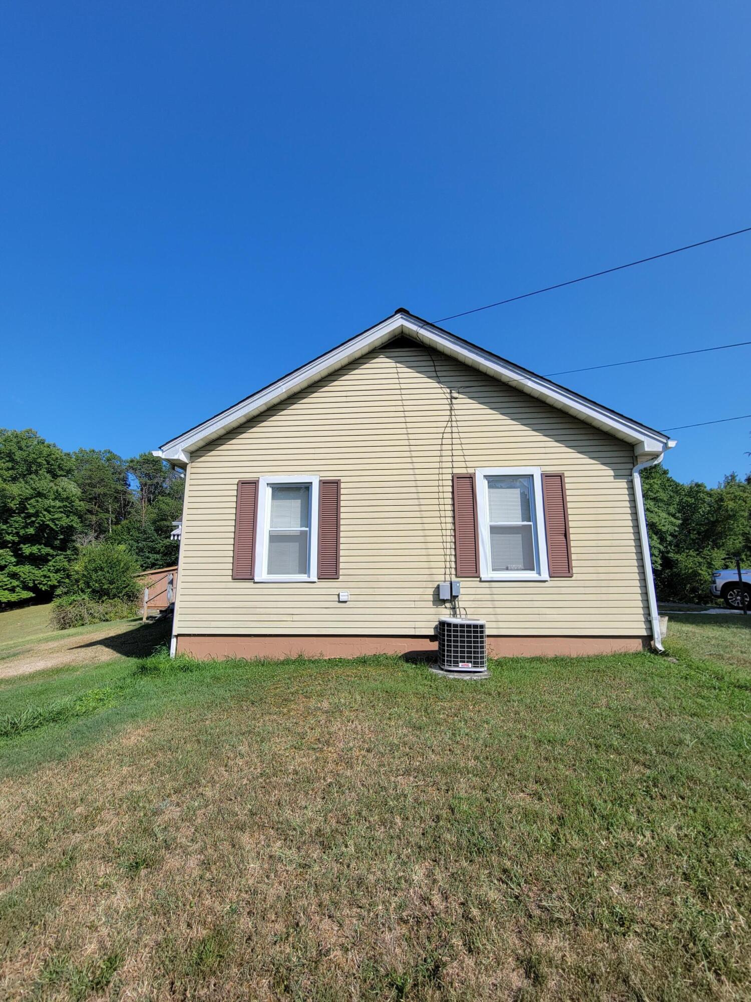 3776 Rutrough Road Southeast Roanoke, VA 24014 - Photo 2 of 12 a front view of house with yard