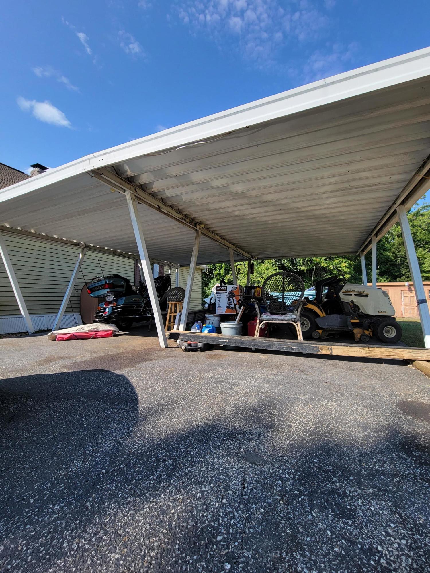 3776 Rutrough Road Southeast Roanoke, VA 24014 - Photo 6 of 12 a view of the patio and car parked