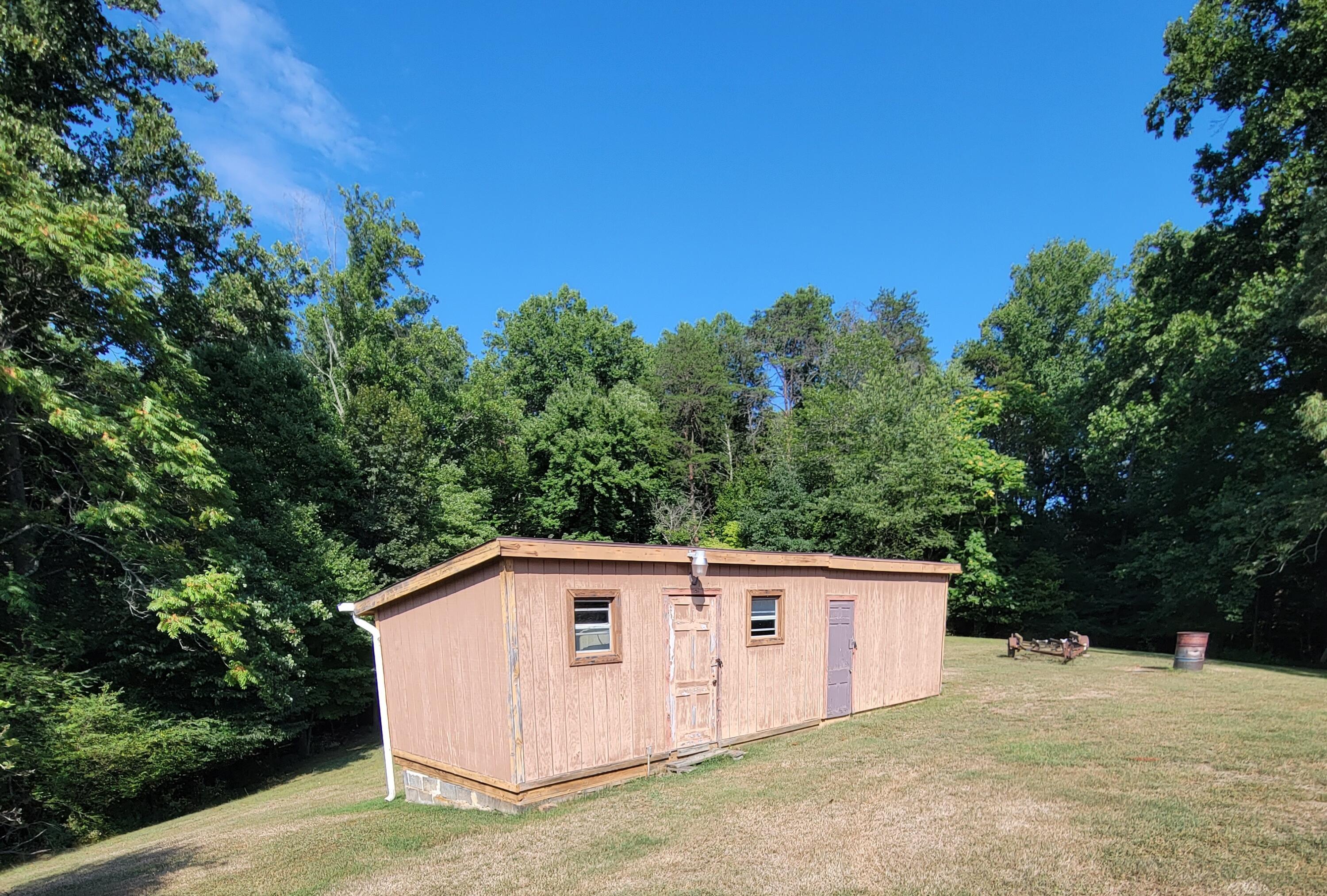 3776 Rutrough Road Southeast Roanoke, VA 24014 - Photo 7 of 12 a view of backyard with green space