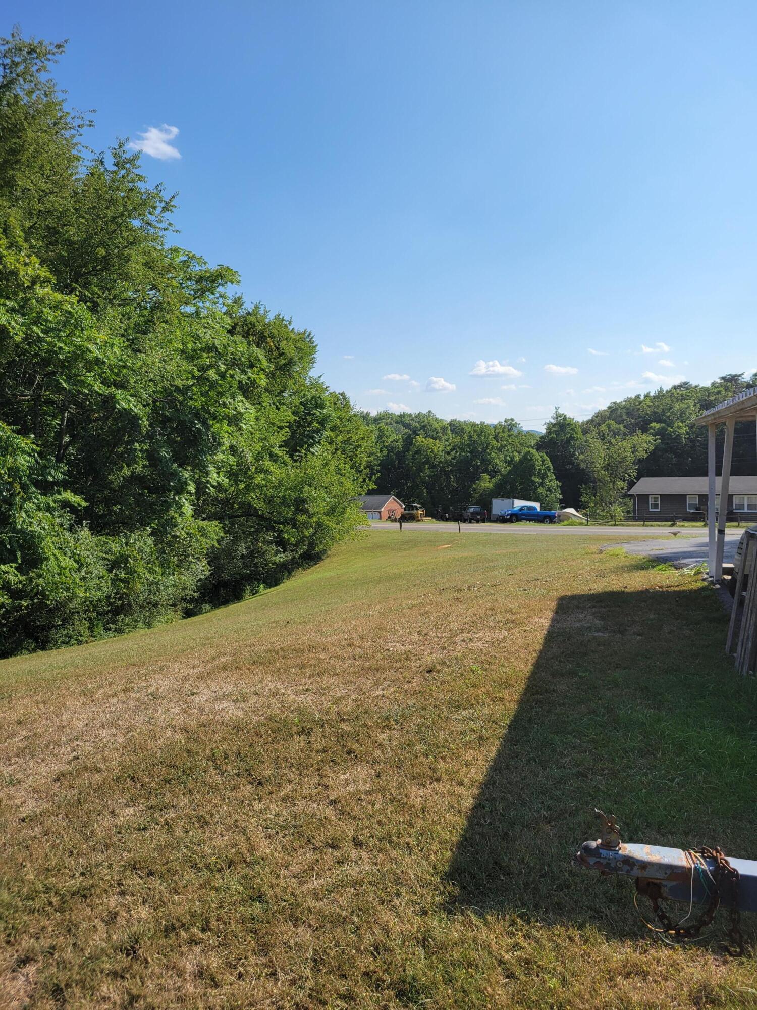 3776 Rutrough Road Southeast Roanoke, VA 24014 - Photo 10 of 12 a view of a lake with outdoor space