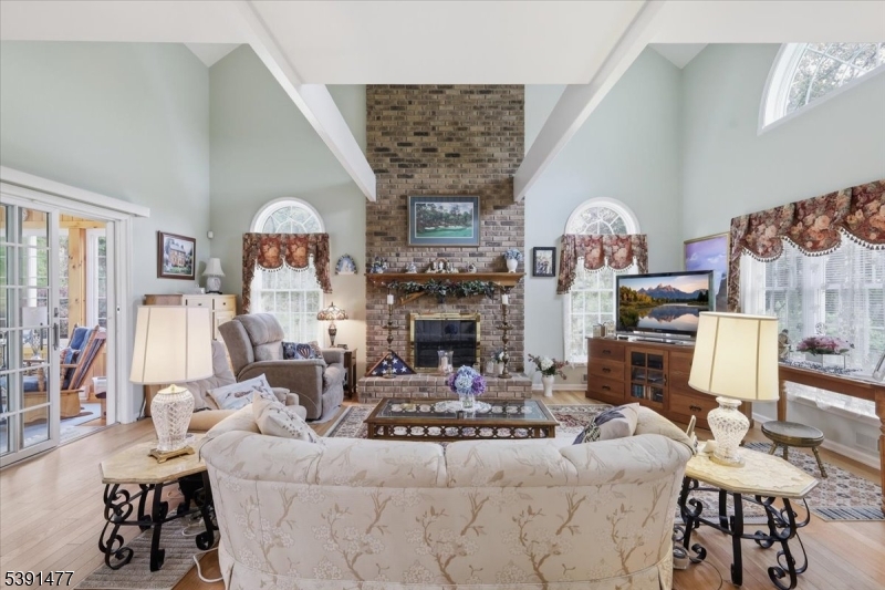 42 Copper Penny Road Flemington, NJ 08822 - Photo 7 of 39 a living room with furniture and a fireplace