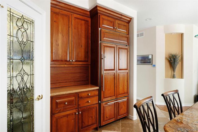 a view of front door with wooden floor