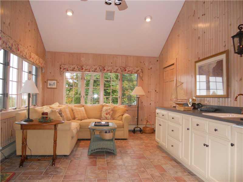 66 Scottow Hill Road Scarborough, ME 04074 - Photo 9 of 22 Sunroom. The sunroom is steps from...