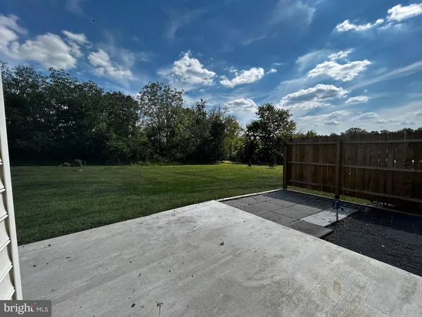 a view of a backyard with a garden