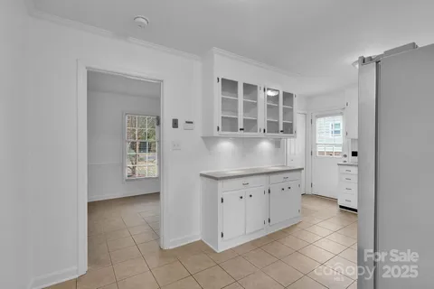 a kitchen with granite countertop a sink