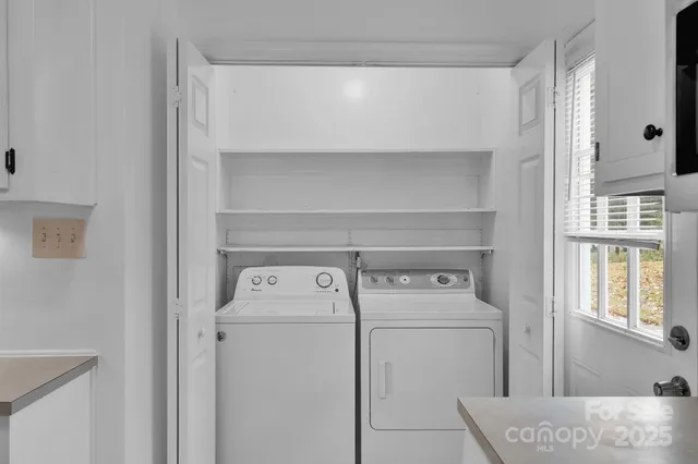 a utility room with dryer and washer