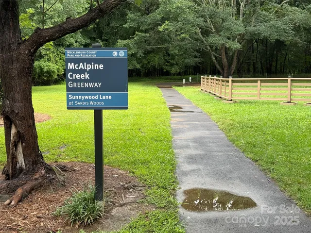 a view of a park with swings