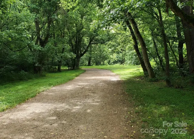 a view of a lake with a big yard