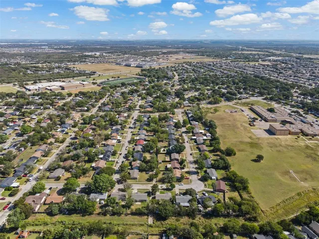 an aerial view of residential building with parking space