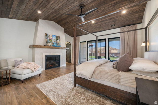 4871 South Homestead Way Washington, UT 84780 - Photo 37 of 151 Bedroom with a vaulted wooden ceiling, recessed lighting, wood finished floors, a large fireplace, and ceiling fan
