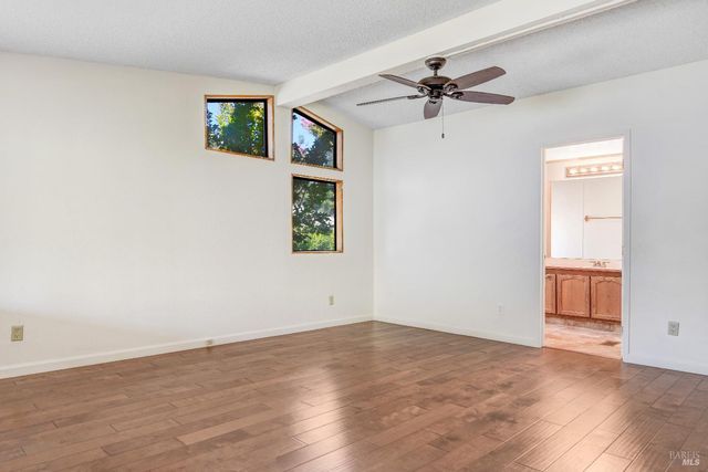 a bathroom with a tub and a sink