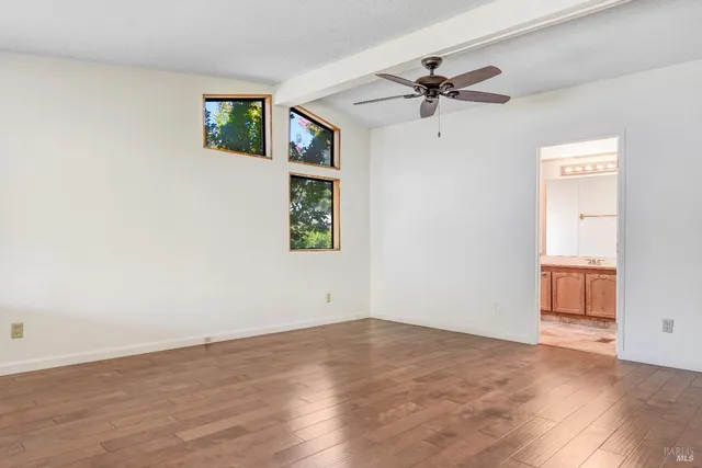 a bathroom with a tub and a sink