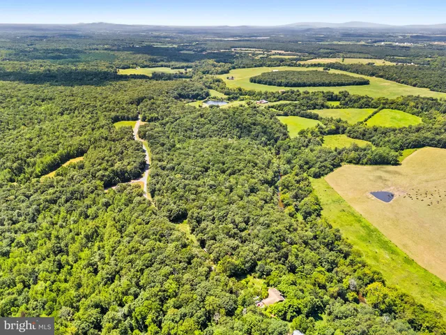 a view of a city with an ocean view
