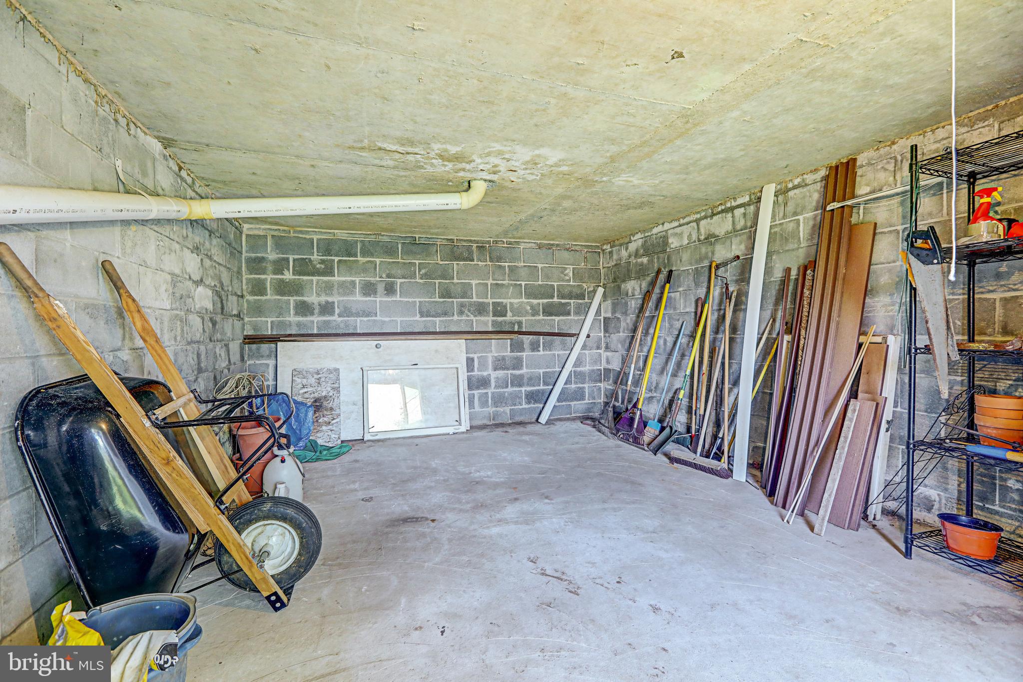 824 Windsor Road Cumberland, MD 21502 - Photo 27 of 28 "She-shed" storage under carport...