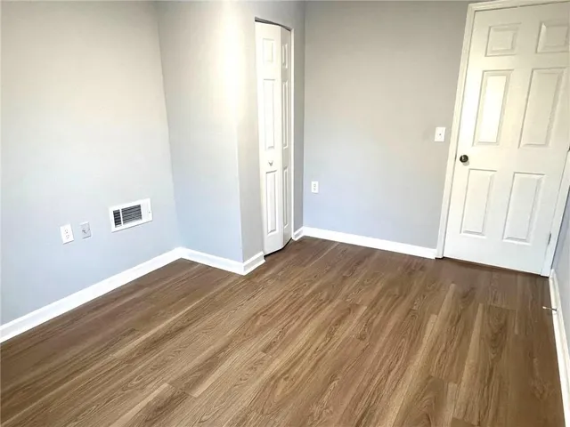 a bathroom with a toilet a sink and bathtub