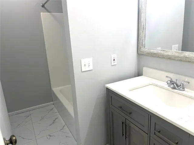 a bathroom with a bathtub