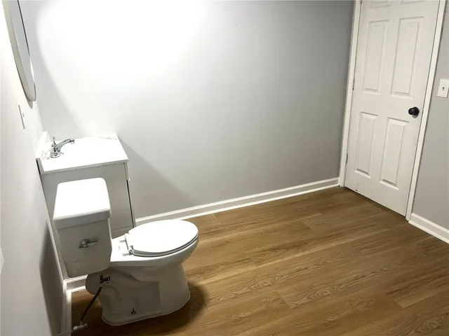 a bathroom with a toilet and a sink