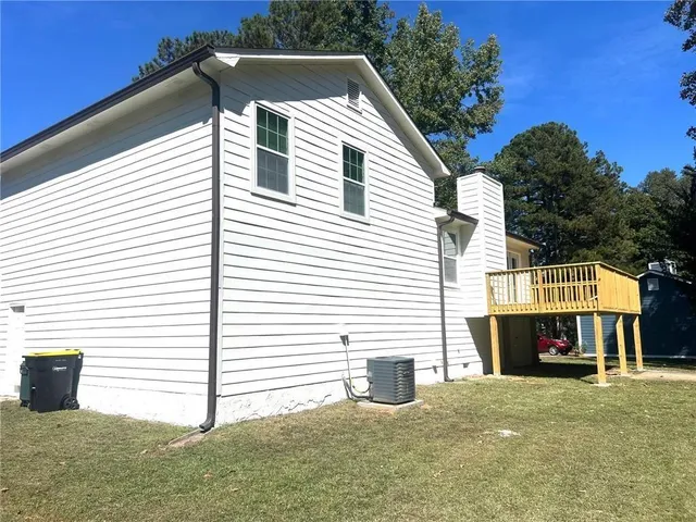 a house view with a garden space
