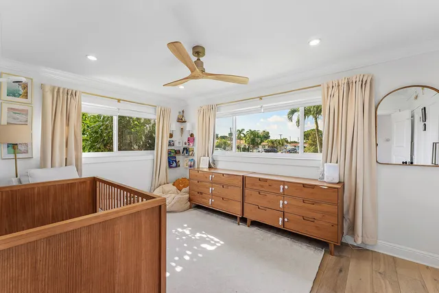 a bedroom with furniture and window