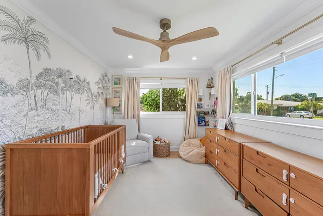 a bathroom with a double vanity sink toilet mirror bathtub and shower