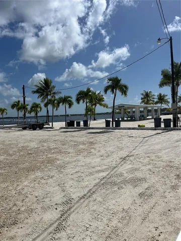 a view of houses with a street