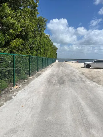 a view of a backyard of the house