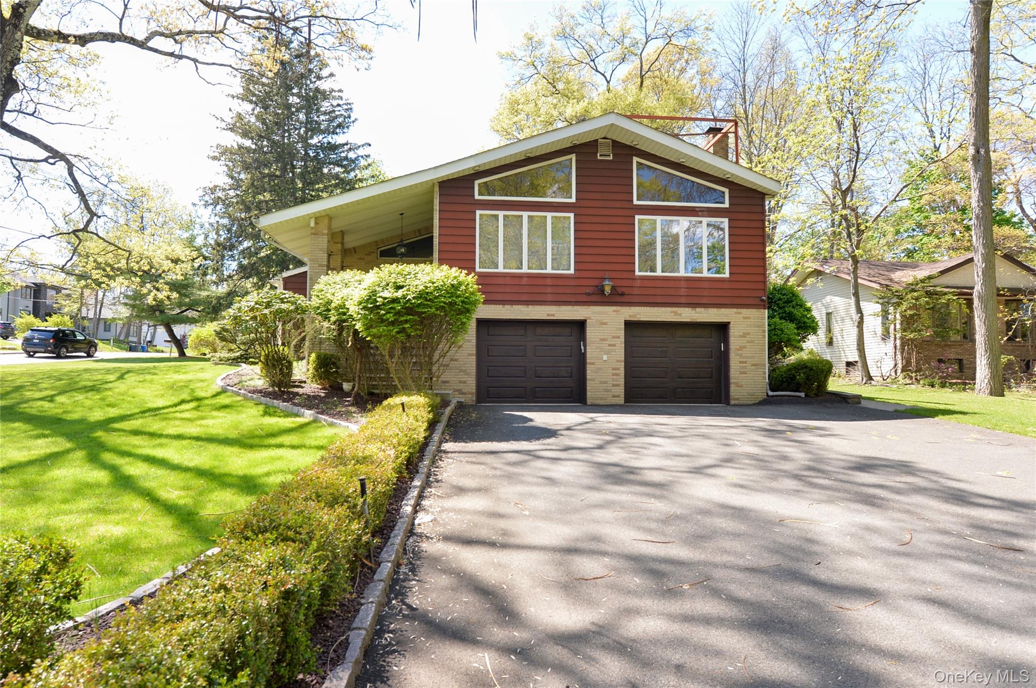 24 Highview Road Monsey, NY 10952 - Photo 3 of 44 a front view of a house with a yard