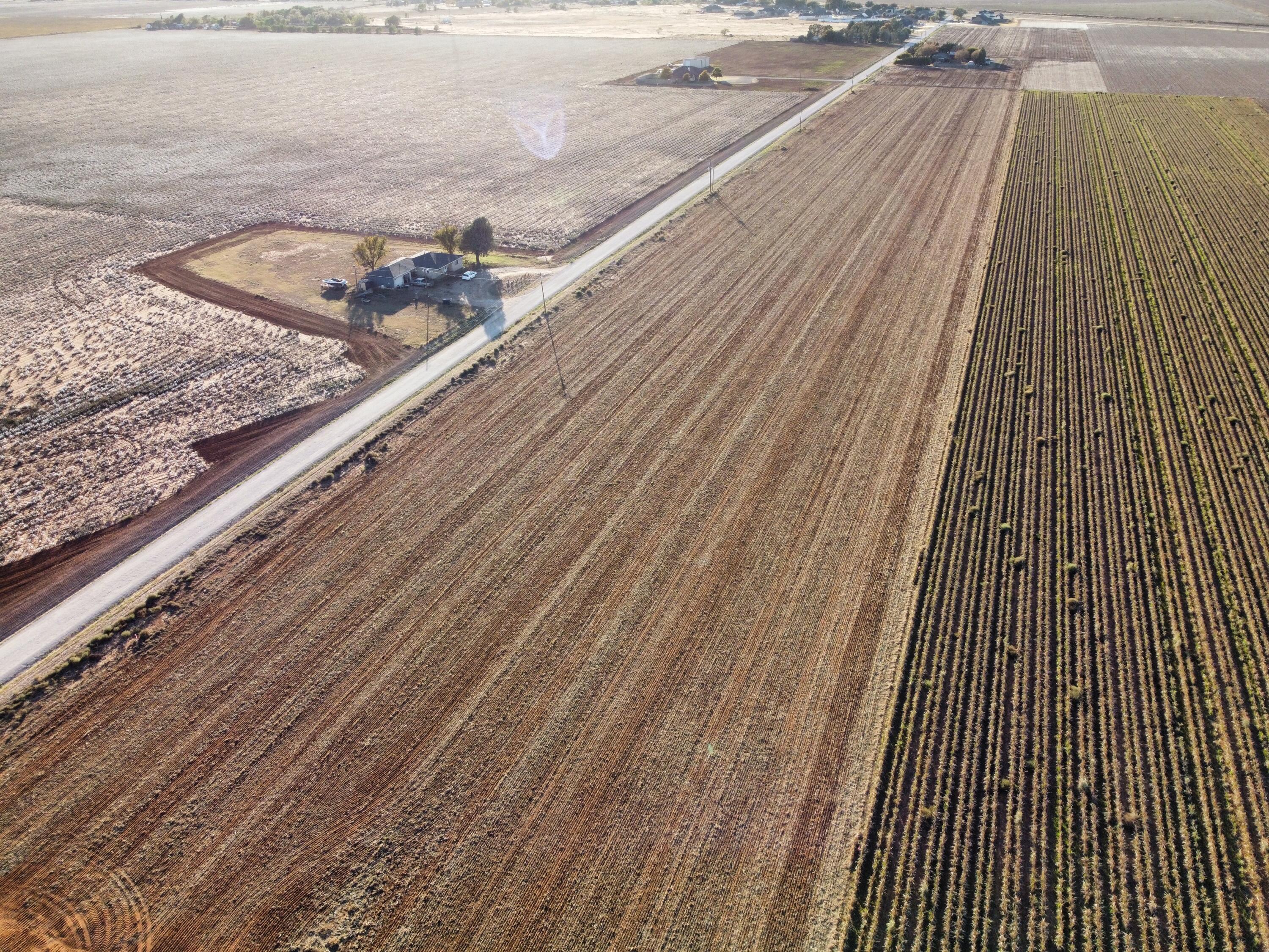 6649 Tiger Road Ropesville, TX 79358 - Photo 4 of 5 a view of a balcony with wooden floor