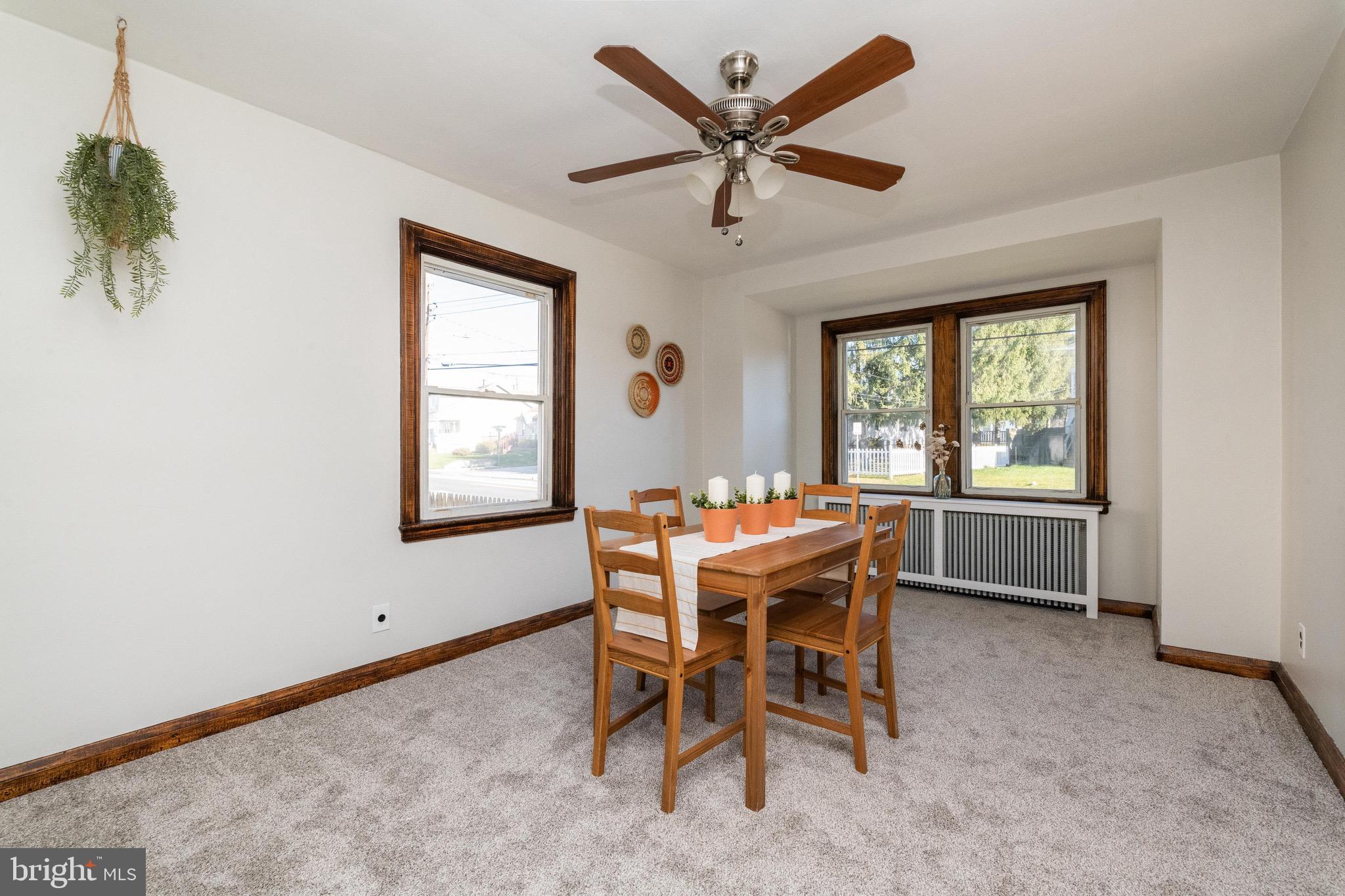 7812 Old Harford Road Baltimore, MD 21234 - Photo 7 of 35 Large dining room with windows all around