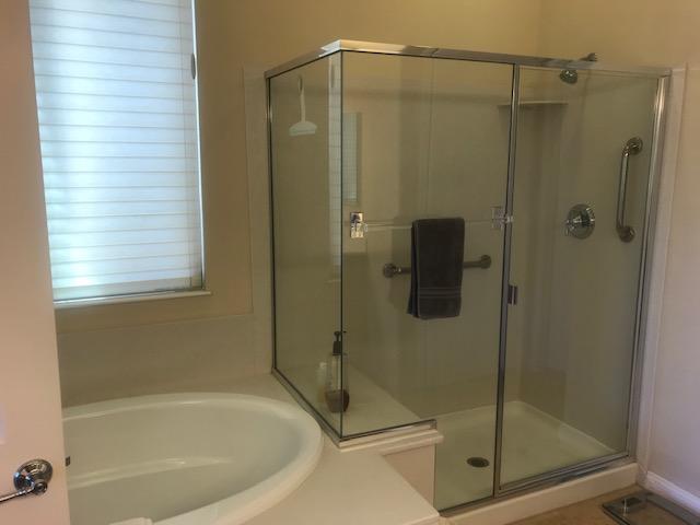 81194 Avenida Sombra Indio, CA 92203 - Photo 17 of 24 a bathroom with a shower and toilet