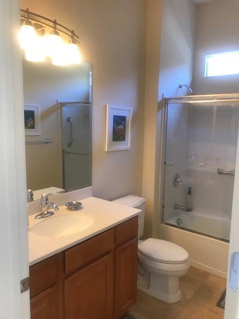 81194 Avenida Sombra Indio, CA 92203 - Photo 22 of 24 a bathroom with a sink a toilet and shower