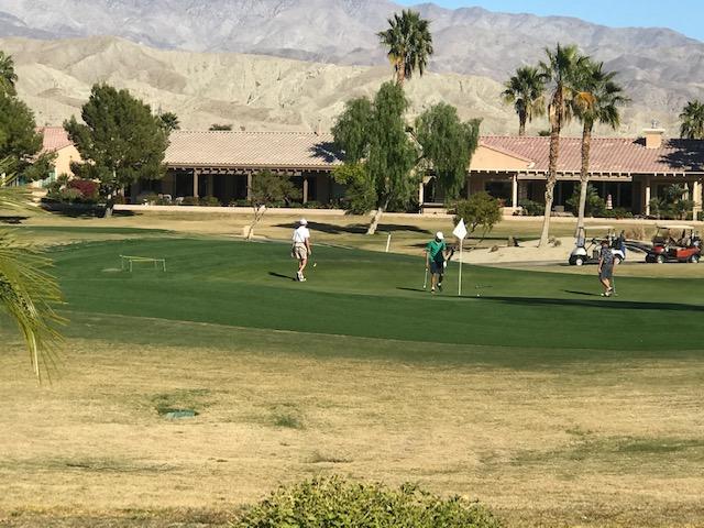 81194 Avenida Sombra Indio, CA 92203 - Photo 3 of 24 a front view of a house with a yard