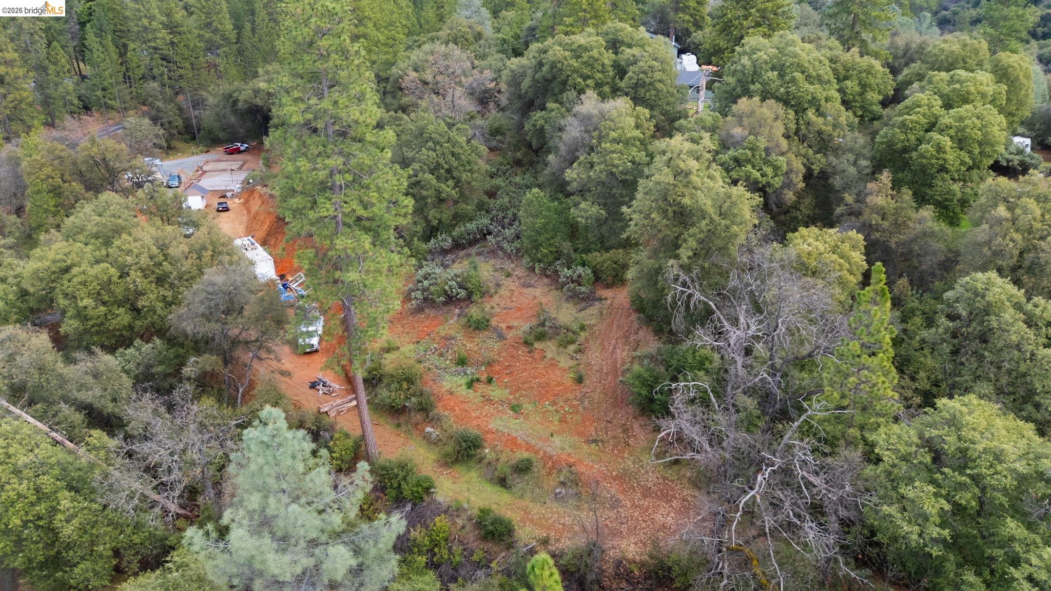 21901 Sawmill Flat Road Sonora, CA 95370 - Photo 15 of 24 an aerial view of residential houses with outdoor space and trees