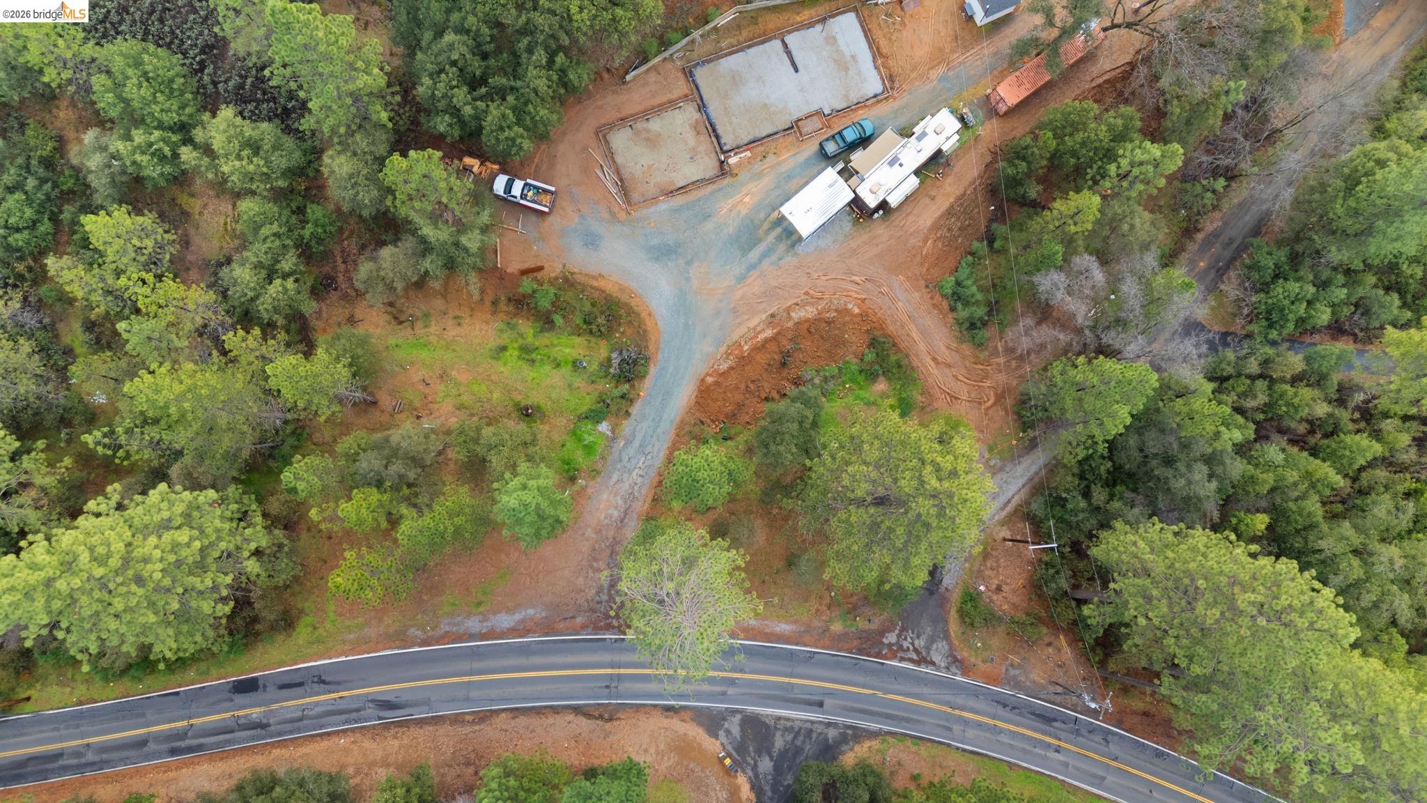 21901 Sawmill Flat Road Sonora, CA 95370 - Photo 9 of 24 a view of a yard in a balcony
