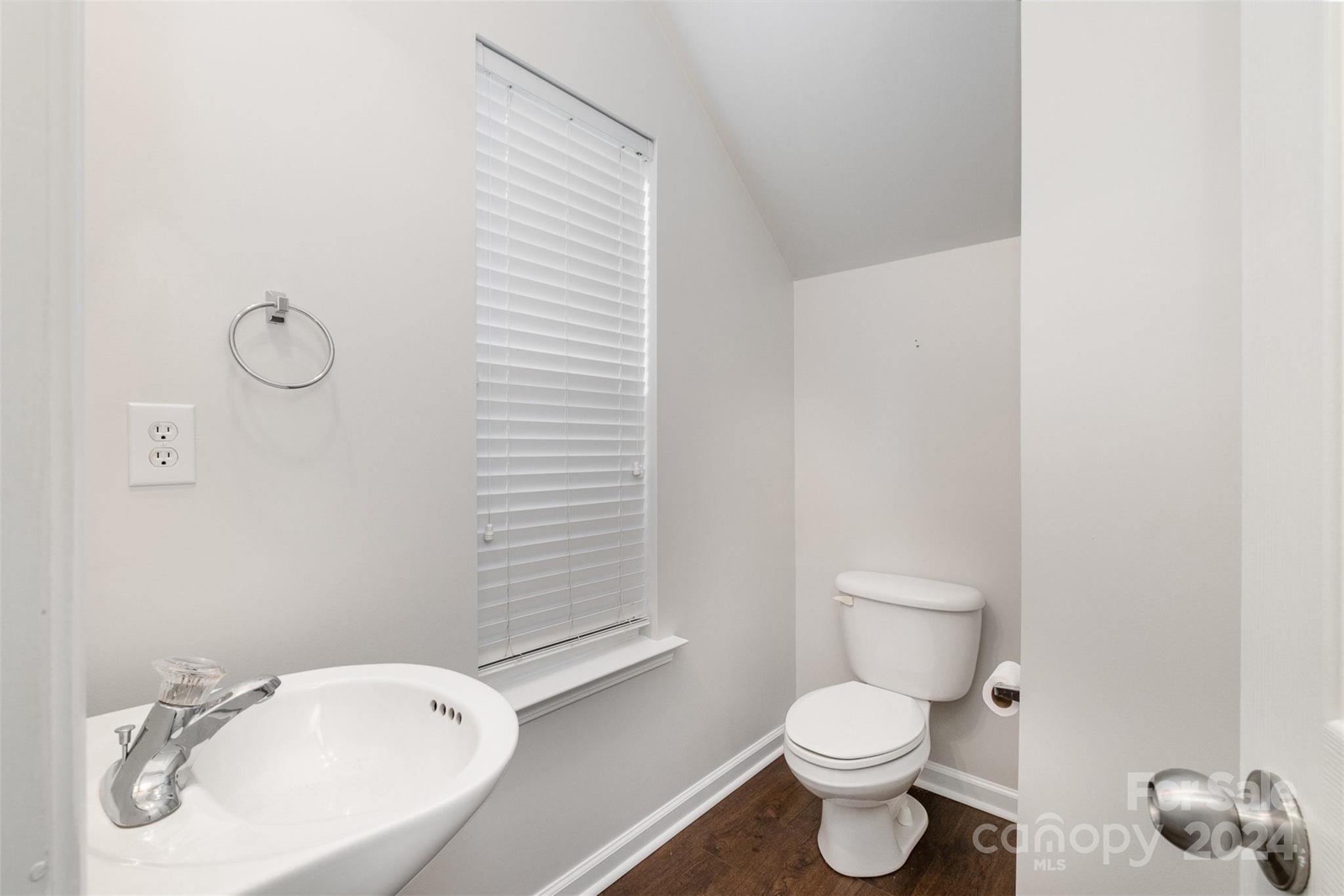 2149 Midnight Blue Lane Fort Mill, SC 29708 - Photo 15 of 30 a white toilet sitting next to a bathroom sink