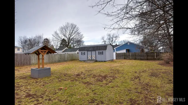 a sign board with yard in front of it