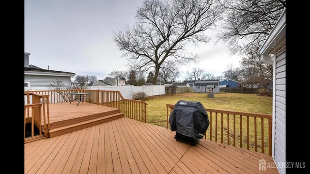 a view of a balcony with wooden floor
