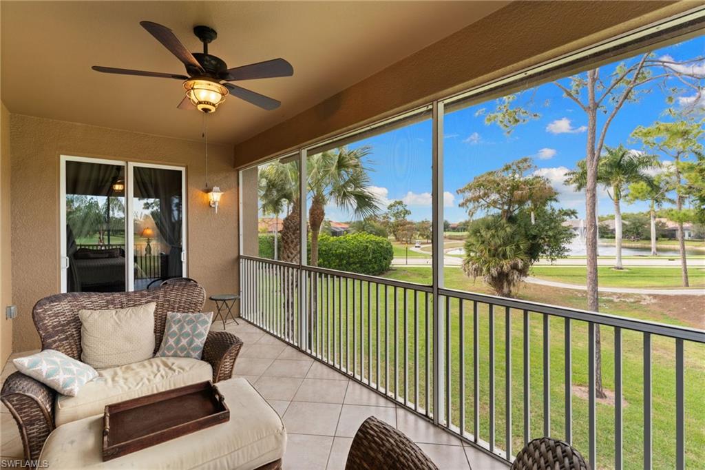 6693 Alden Woods Circle, Unit 202 Naples, FL 34113 - Photo 25 of 25 a balcony with furniture and a potted plant