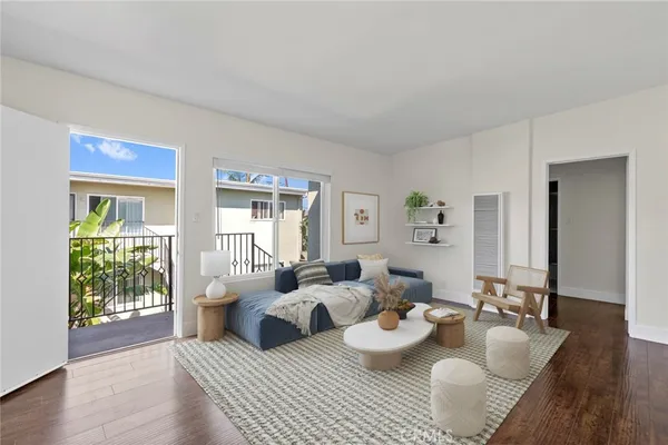 a room with furniture and wooden floor